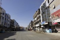 Zatvorené trhovisko počas bojov medzi Talibanom a afganskými bezpečnostnými silami v Kandaháre, juhozápadne od Kábulu 12. augusta 2021.