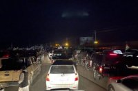 Afganské vojenské vozidlá odchádzajú z Kandaháru 12. augusta 2021 počas bojov medzi Talibanom a afganskými bezpečnostnými silami.